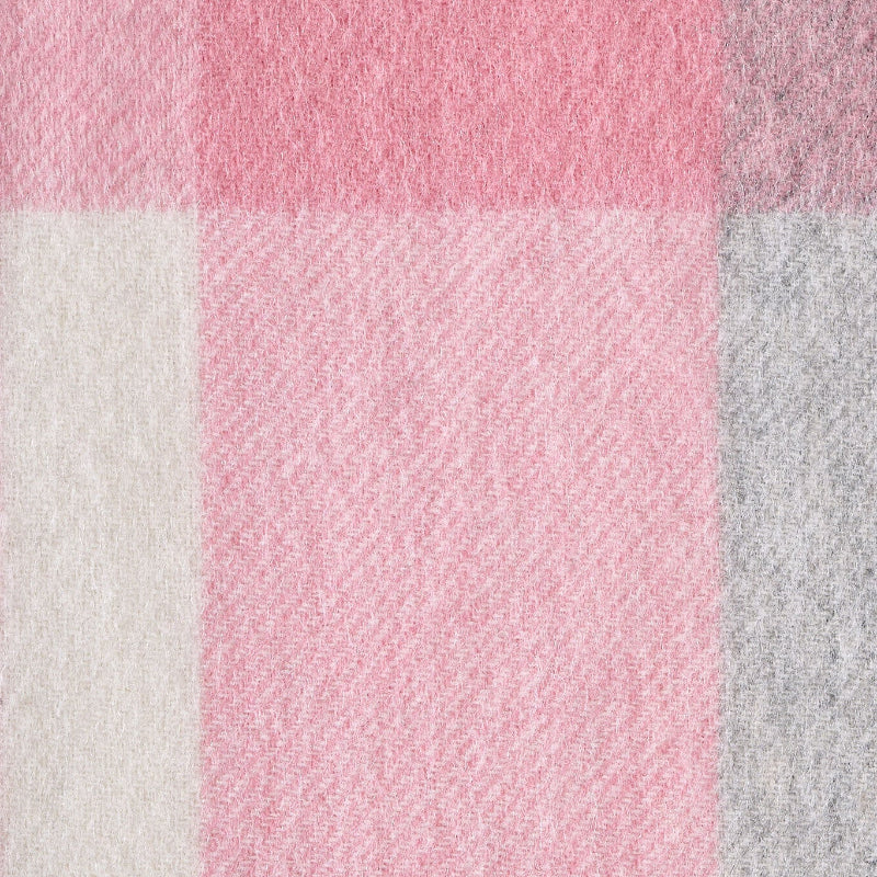 Close-up of pink and gray checkered wool fabric