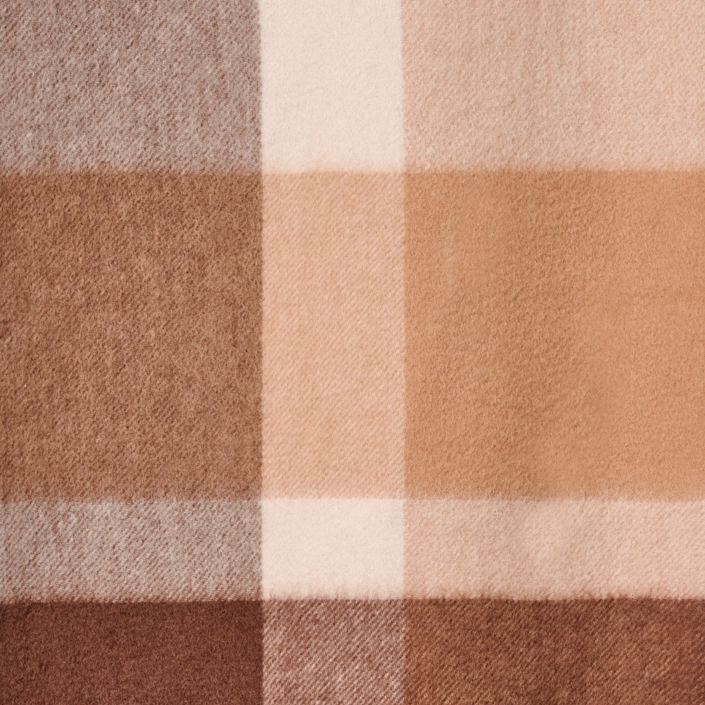 Flat lay of a solid colour wool scarf, a wool scarf showing the material.