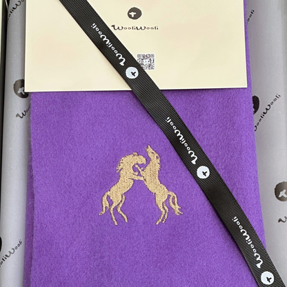 Purple scarf with gold horse design and black strap, branded 'WooliWooli'
