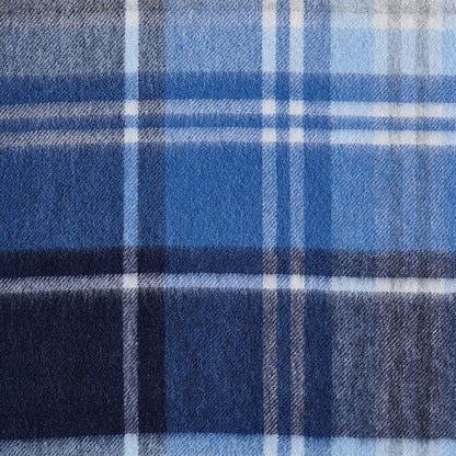 Flat lay of a blue checkered scarf, a wool scarf showing the material.