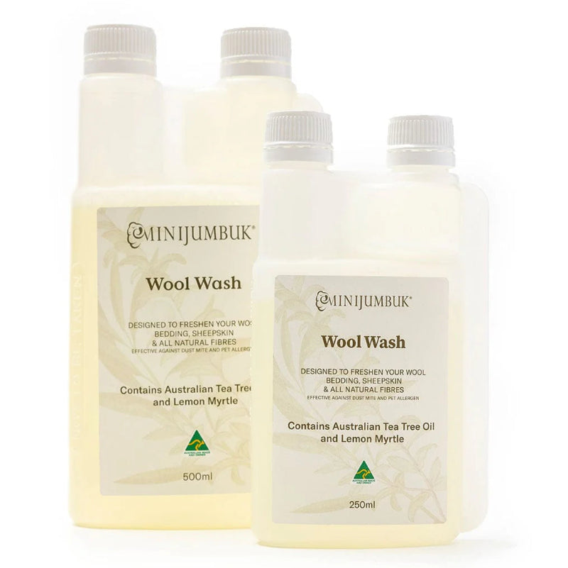 Two bottles of Wool Wash with labels detailing the product name and ingredients such as Australian Tea Tree Oil and Lemon Myrtle.