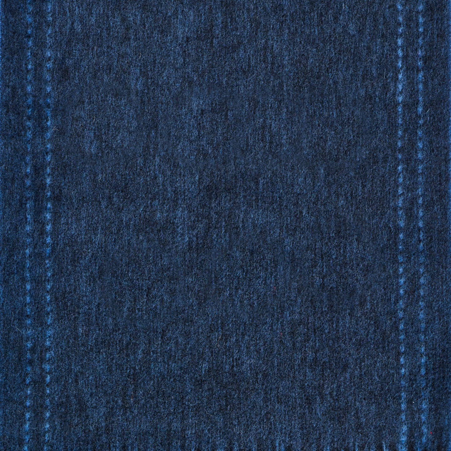 Close-up of blue denim wool fabric texture