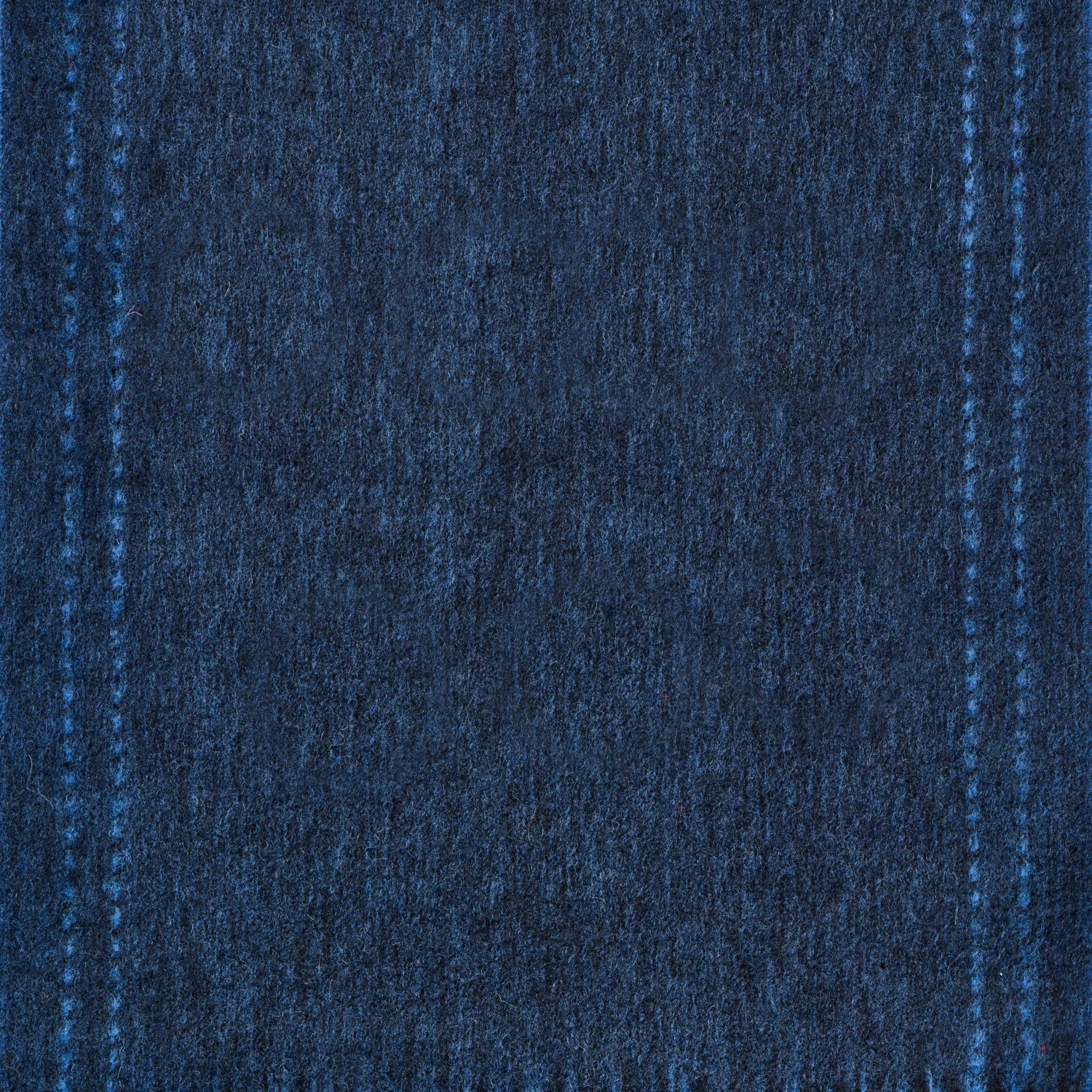 Close-up of blue denim wool fabric texture