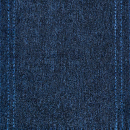 Close-up of blue denim wool fabric texture