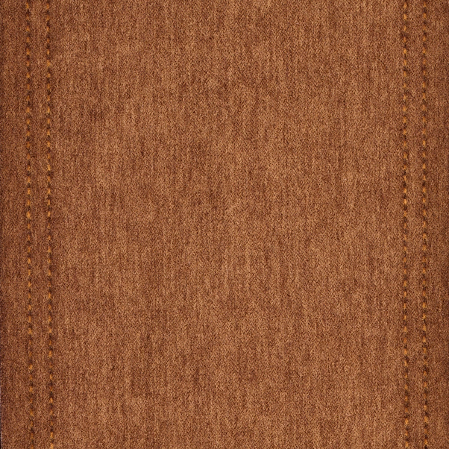 Close-up of brown wool fabric texture with stitching details