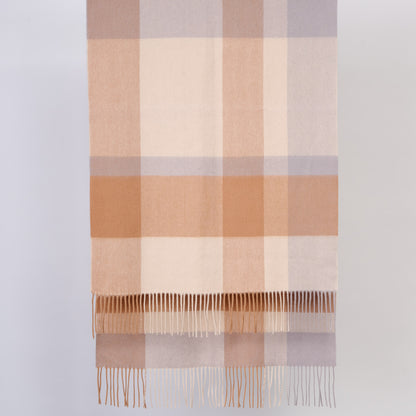 Plaid scarf with brown, beige, and purple colors on a light gray background