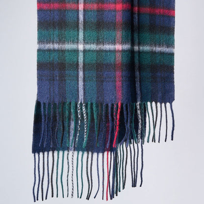 Red, Green, Blue Plaid scarf with fringes on a gray background