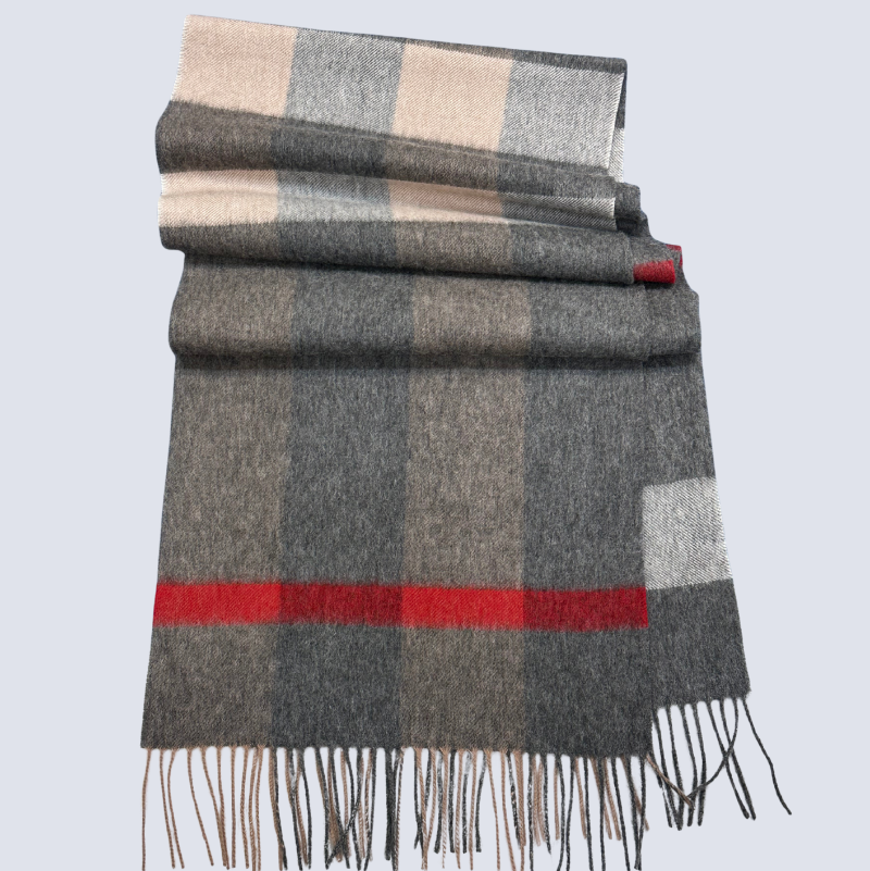 Checkered scarf with gray, beige, and red colors on a light gray background