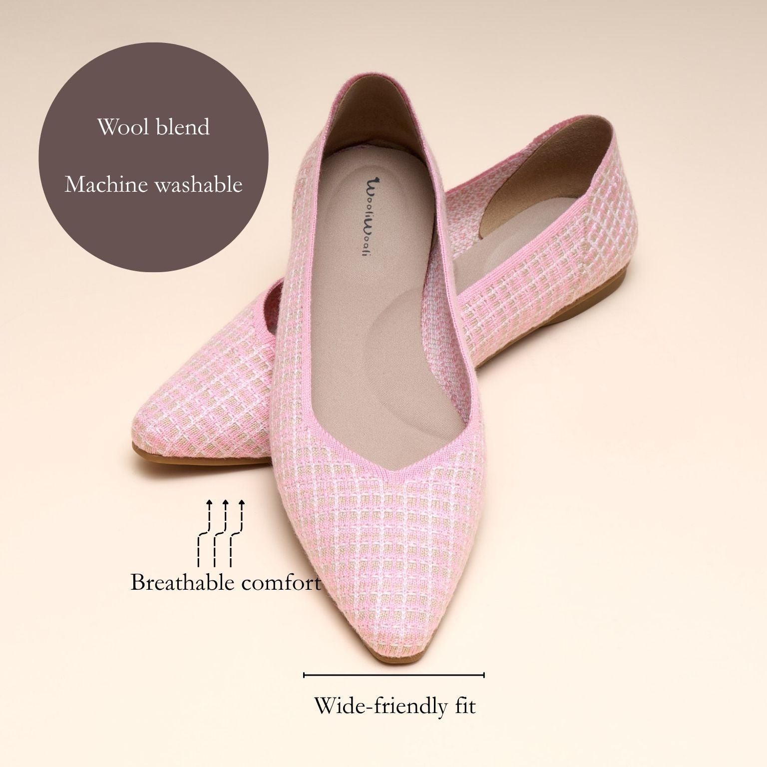 Pink loafers with text highlighting features on a beige background