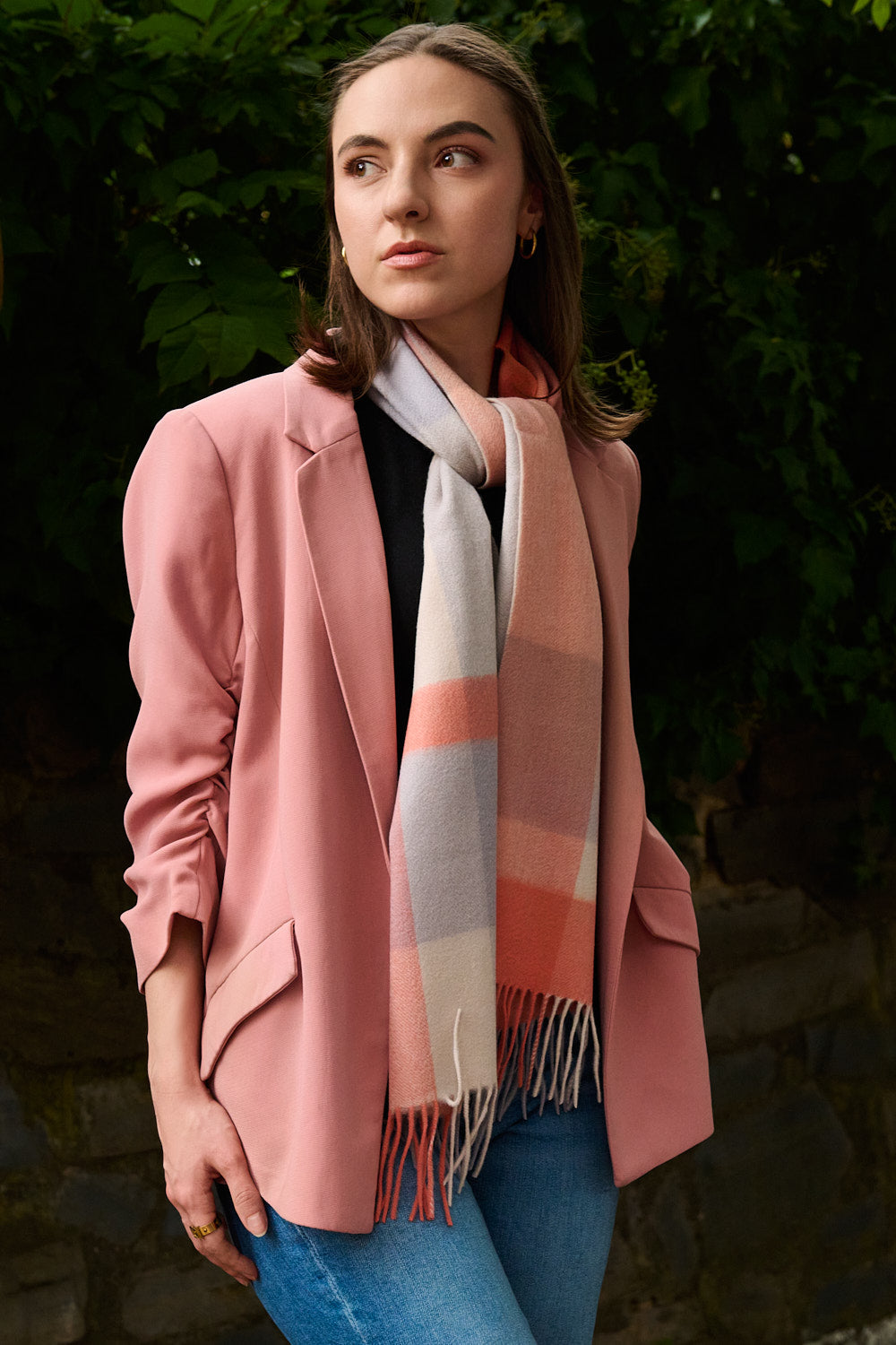 Woman wearing a WooliWooli wool scarf
