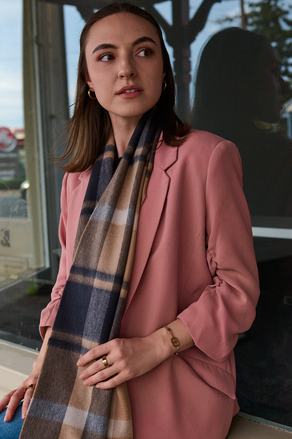 Woman wearing an Australian Made Merino wool scarf outdoors